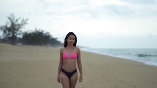 The Shy Snow Woman and the Cursed Ring - shallow focus of woman in bikini walking on beach | Tr