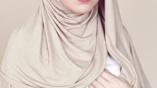 The Pioneer Woman - woman in brown hijab looking serious | Trending HD Video