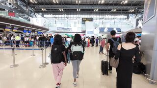 Travelpro - busy airport terminal with travelers walking | Trending HD Video