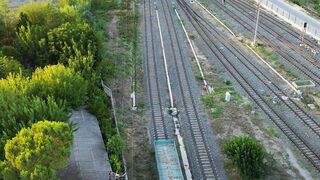 Travel Backpack - aerial view of train traveling through countryside | Trending HD Video