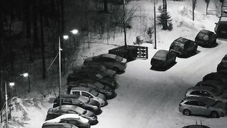 Winter Coat - grayscale video of parked cars near light posts | Trending HD Video