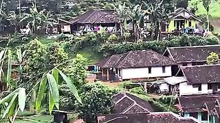 A collection of simple country houses on the hillside