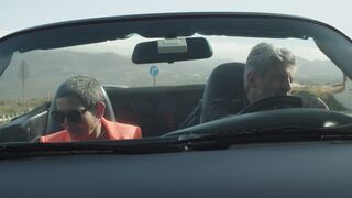 Travelon - a couple going down on the car and carrying their travel bags | Trending HD Video