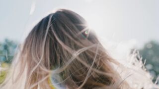 Woman Within - close up video of a woman flipping her hair | Trending HD Video