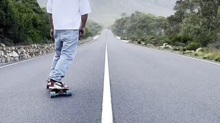 Travel Backpack - skateboarding adventure on mountain road | Trending HD Video