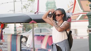 Wonder Woman - a woman taking a photo using dslr camera | Trending HD Video
