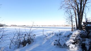 Winter solstice - wide angle shot of a frozen river | Trending HD Video