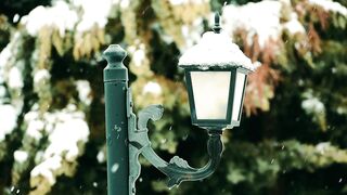 Winterhalter - vintage snowy streetlamp in winter scene | Trending HD Video