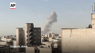 Smoke rises from Tehran as US and Israel launch attack on Iran.