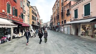 travelite - a city street with people walking down it | Trending HD Video