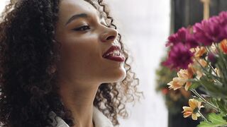 The Bold and the Beautiful - woman looking at flowers | Trending HD Video