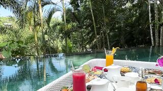 Travel Backpack - floating breakfast in bali lagoon retreat | Trending HD Video