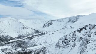 The Pioneer Woman - a stunning winter landscape with snowy mountains | Trending HD Video