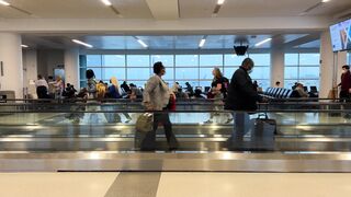 Travel Backpack - people in airport terminal | Trending HD Video
