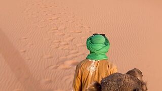 travelite - camel ride through majestic sahara desert dunes | Trending HD Video