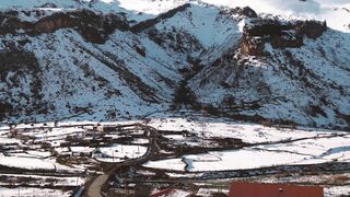 Winter Coat - snow covered mountain village | Trending HD Video