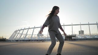 The Shy Snow Woman and the Cursed Ring - woman dancing outdoors by modern stadium | Trending HD