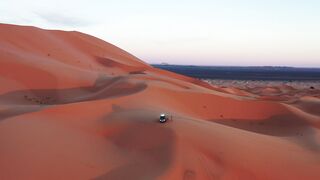 Travelpro - stunning aerial view of desert dunes at sunset | Trending HD Video