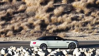 Travelpro - car cruising along rocky coastline road | Trending HD Video