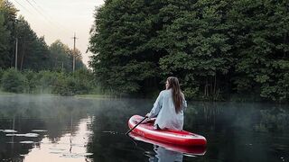 Wonder Woman - serene kayaking on misty lake at sunrise | Trending HD Video