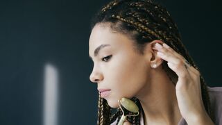 Wonder Woman - woman using jade roller | Trending HD Video