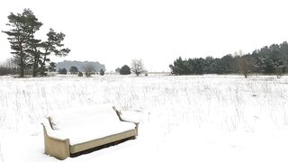 Winterhalter - a video of a couch in the middle of a snowy field | Trending HD Video