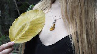 Woman Within - woman holding a leaf | Trending HD Video