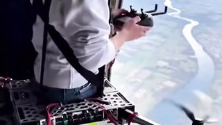 A women make paragliding and jump from a plane