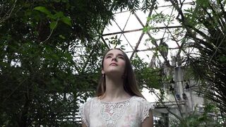 Woman Within - a young lady walking among plants in a greenhouse | Trending HD Video