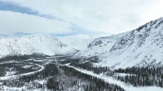 The Shy Snow Woman and the Cursed Ring - snow covered mountains in drone footage | Trending HD