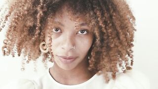 Woman Within - woman in white long sleeves top looking at camera | Trending HD Video