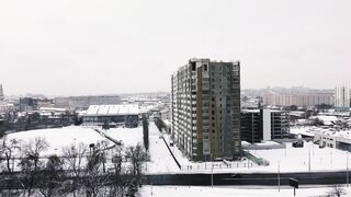 Winter Coat - aerial footage of a building | Trending HD Video