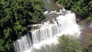 Travel Backpack - drone footage of a cascading waterfalls | Trending HD Video