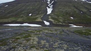 Travelon - scenic aerial view of snowy mountain valley | Trending HD Video