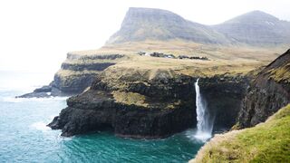 Travel Backpack - scenic waterfall in majestic faroe islands | Trending HD Video
