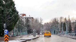 Winterhalter - yellow taxi drives on snowy urban street | Trending HD Video