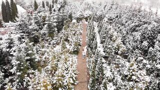 Snow boot - mother and child walking on the snow | Trending HD Video