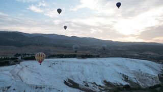 travelite - hot air balloons over scenic pamukkale sunset | Trending HD Video