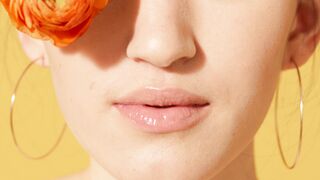The Pioneer Woman - woman with yellow makeup holding a flower | Trending HD Video