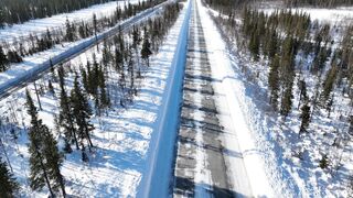 Winter solstice - aerial video of a forest road in the winter season | Trending HD Video