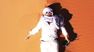 Travelpro - stunning aerial view of person in sahara desert | Trending HD Video