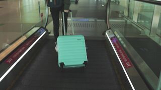 Woman - a woman walking with her suitcase | Trending HD Video
