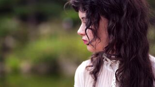Woman Within - contemplative woman displaying emotion outdoors | Trending HD Video
