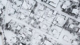 Winterhalter - drone shot of snow covered houses | Trending HD Video