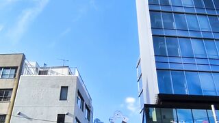 travelite - bustling city street with tall buildings | Trending HD Video