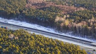 Winter Coat - aerial winter forest and roadway view | Trending HD Video