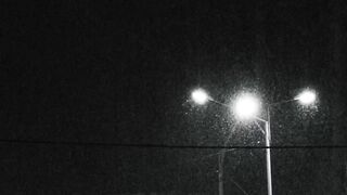 Winter Coat - street lamp turned on at night | Trending HD Video