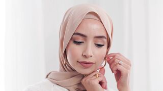 The Shy Snow Woman and the Cursed Ring - close up of a woman wearing earrings | Trending HD Vid