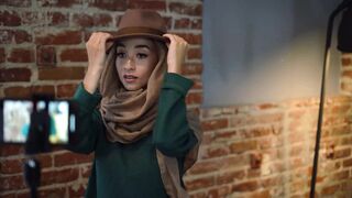 The Bold and the Beautiful - woman in brown hijab doing a product video blog | Trending HD Vide