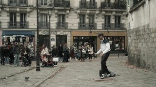 Travelon - street performer in bustling paris square | Trending HD Video 2
